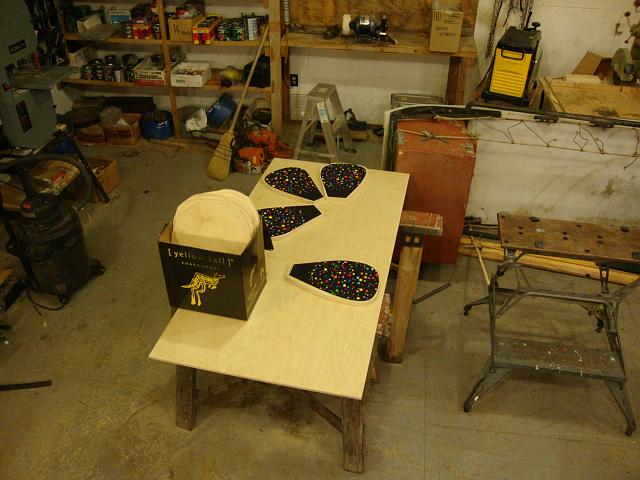 wallflower assembly (27).JPG - wallfowers being assembled at the shop.  rough petal shaped wood is cut out on the bandsaw first.